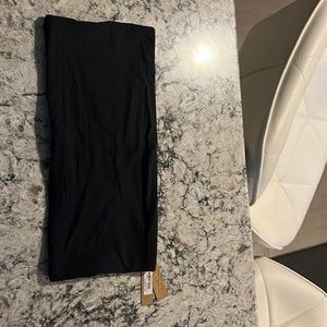 Skims tub top, brand new with tags. The top runs small and didn’t fit me.